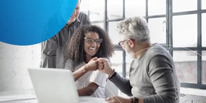 After a online emerging leadership certification course a woman celebrates it with her manger