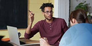 A sales rep handling a customer objection 